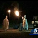 Cary Sharp and friends dressed as Ku Klux Klan members carrying torches near a cross in Lahoma, Okla., Oct. 31, 2015
KOCO screenshot